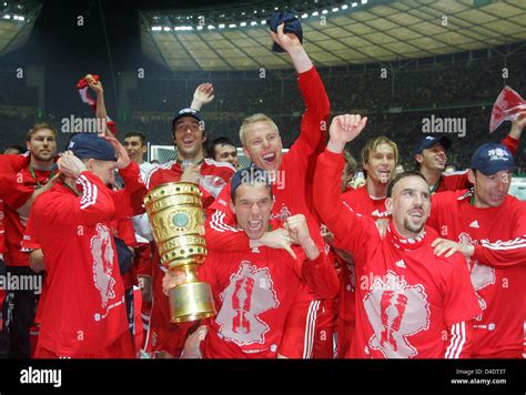 Bayern Munich S Bastian Schweinsteiger L R Luca Toni Lukas Podolski