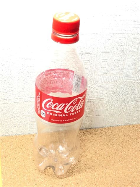 Empty Coke Plastic Bottle