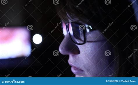 Hacker Girl Works At The Computer And Smoking Electronic Cigarette