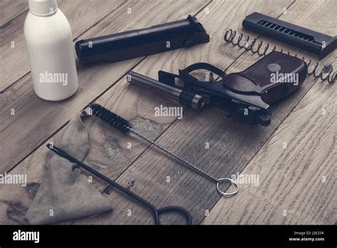 Separate parts of Makarov pistol and cleaning kit Stock Photo - Alamy