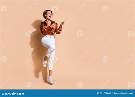 Full Length Photo Of Funky Impressed Lady Dressed Brown Top Jumping