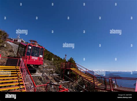 Scene View Of A Red Funicular Car In The Mountain At Cerro Otto In