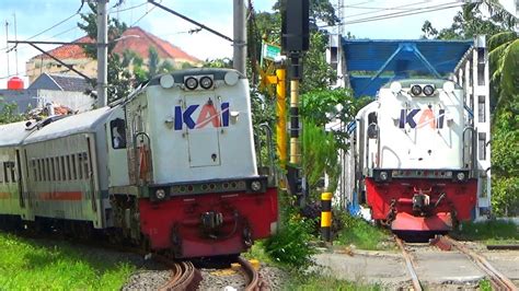 SERU NYEGAT DUA KERETA API LOKAL MERAK DI PERLINTASAN JPL 184