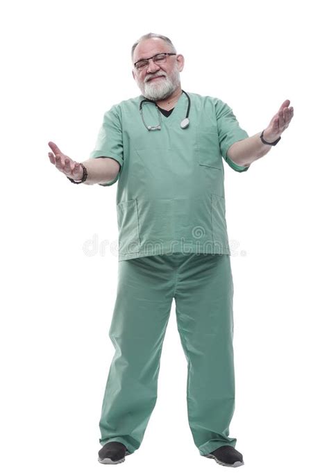 Mature Architect With A Roll Of Drawings Stepping Forward Stock Image