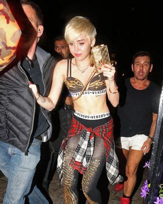 Miley Cyrus Wore Gold Chain Mail in London