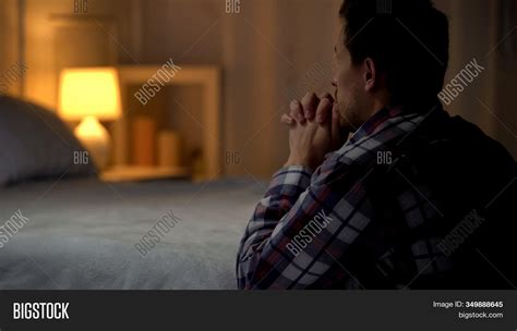 Man Kneeling Near Bed Image Photo Free Trial Bigstock