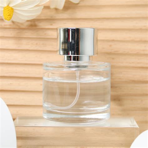 Supply 50ml 100ml Empty Round Glass Atomizer Perfume Bottle Wholesale Factory Xuzhou Daxin