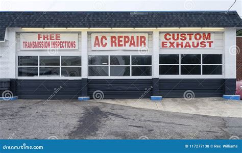 Auto Repair Shop Bays Transmission Air Conditioning Exhaust Stock Photo