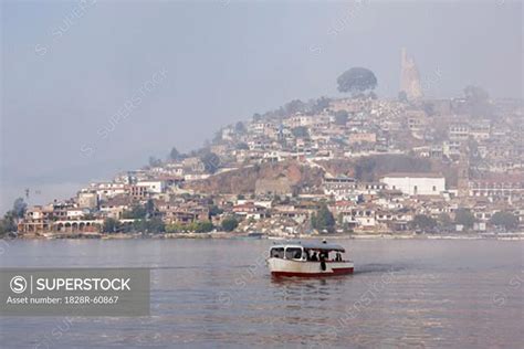 Boat On Lake Patzcuaro With Janitzio Island In Background Patzcuaro