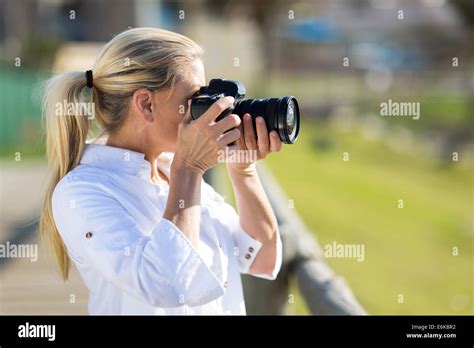 Amateur Middle Aged Photographer Shooting Pictures Outdoors Stock Photo Alamy