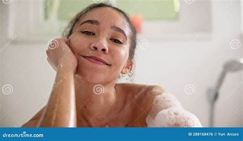 Happy Peace And Face Of A Woman In A Bath At Her Home For Calm