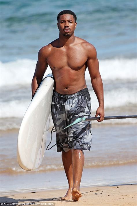 Michael B Jordan Takes Plunge While Paddleboarding In Maui Daily Mail Online