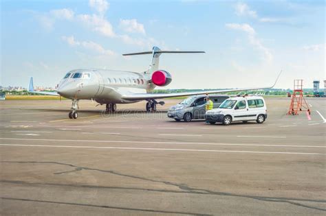 Airplane And Cars At Runway Editorial Photography Image Of Aerodrome