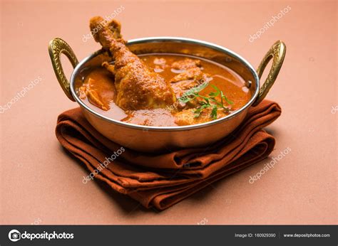 Indian Spicy Chicken Curry Or Masala Chicken With Prominent Leg Piece