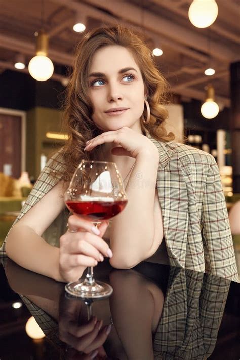 Elegant Beautiful Brunette Woman With Glass Of Red Wine Stock Image