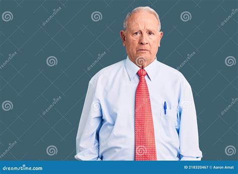 Senior Handsome Grey Haired Man Wearing Elegant Tie And Shirt Depressed