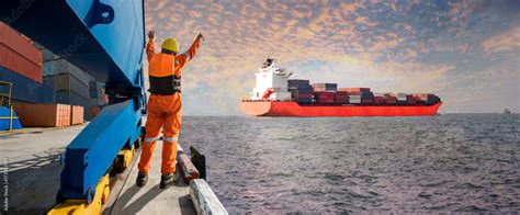 Panorama Container ship vessel departure from the sea port terminal ...