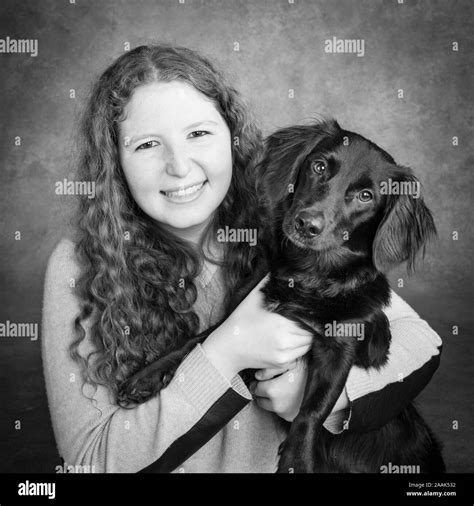 Woman Holding Dog Or Puppy Hi Res Stock Photography And Images Alamy