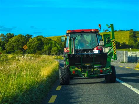 Tractor on the Road in Ireland Editorial Stock Image - Image of farming ...