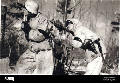 World War Two Bandw Photo German Soldiers In Snow Camo Parkas Fire An