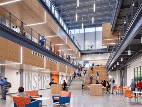 Triple Height Atrium With Seating At Base Of Stairwell With Stepped