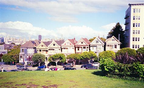 body  water surrounded  grass  buildings  stock photo