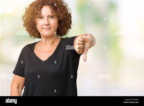 Beautiful Middle Ager Senior Woman Over Isolated Background Looking