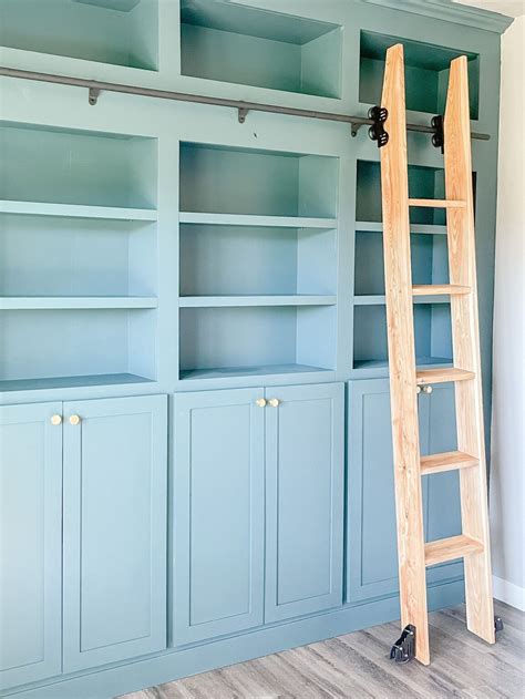 How To Build A Rolling Library Ladder Library Ladder Library Wall Built In Bookcase