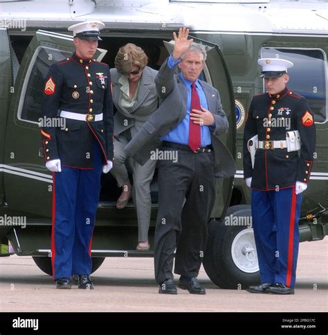 President Bush Waves Before He And First Lady Laura Bush Leave Waco