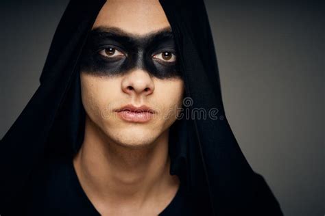 Man In Black Mask Halloween Horror Ghost Dark Background Stock Photo