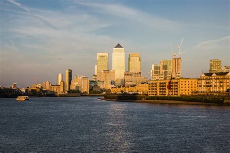 sunset  canary wharf finance district  office buildings stock