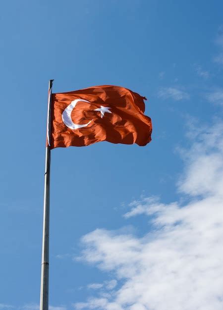 Premium Photo Turkish National Flag With White Star And Moon In Sky