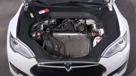 Tesla Modified With Gas Engine Gets an Oil Change And Gas | Torque News