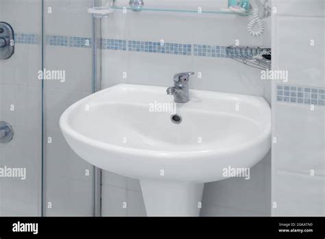 White Ceramic Sink In Bathroom Stock Photo Alamy