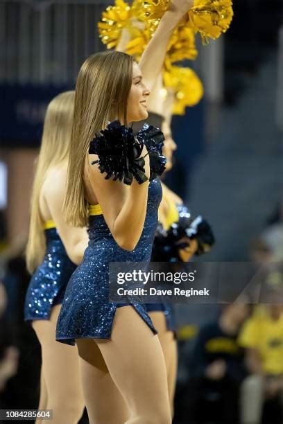 Michigan Wolverines Cheerleaders Photos and Premium High Res Pictures ...