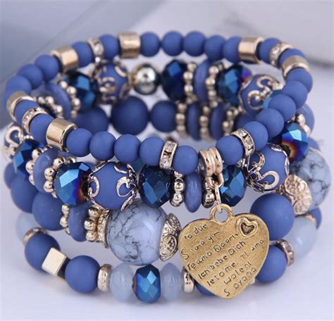 Set Van Kralen Armbanden Met Blauwe Kralen En Hart Bedel