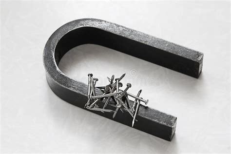 Magnetic attraction stock image. Image of device, nailing - 24226895
