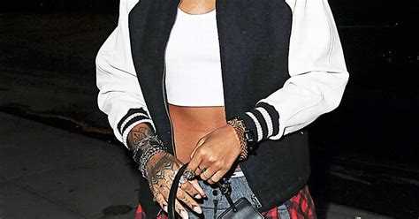 Rihanna Smiles Defiantly As She Heads Out In The Wake Of Nude Pics Scandal Irish Mirror Online