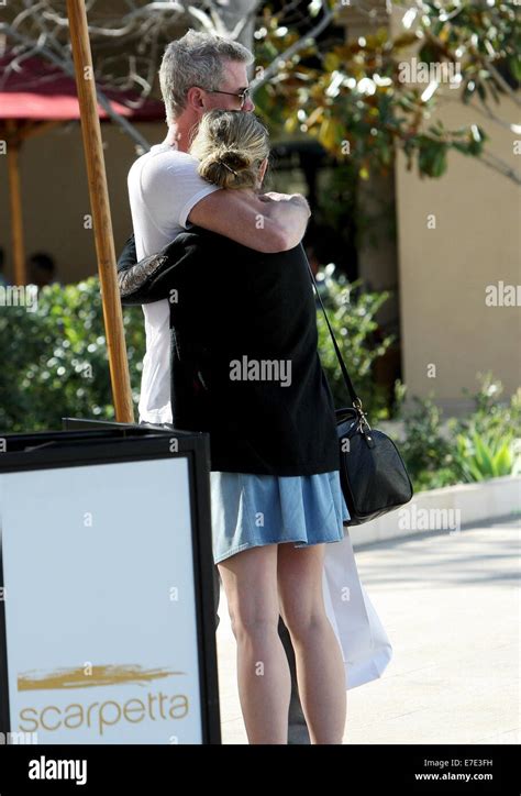 Eric Dane With Wife Rebecca Gayheart Out And About Walking Holding