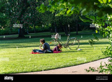 The People Enjoying Summer In The Orangerie Park Strasbourg Stock
