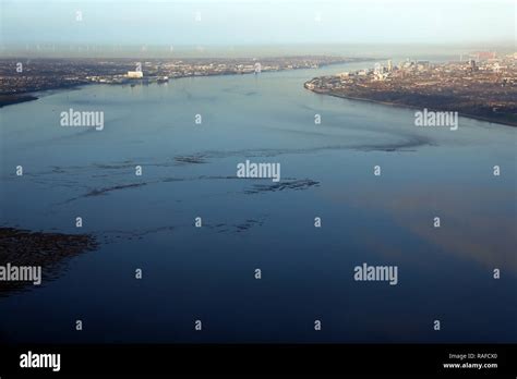 Aerial View Looking North Over The River Mersey Estuary Towards