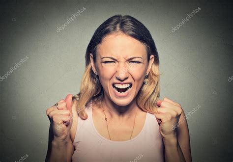 Portrait Of Young Angry Woman Screaming Stock Photo By ©siphotography