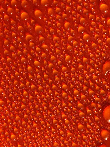 Premium Photo Full Frame Shot Of Water Drops On Orange Surface