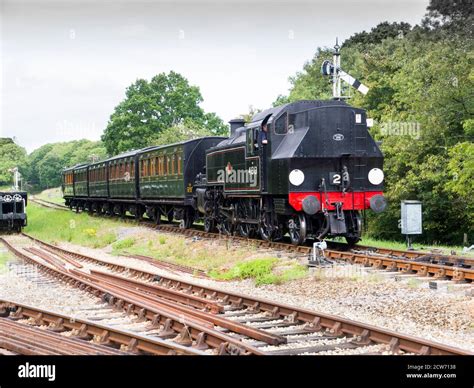 Ivatt Class 2 Locomotive 41313 With A Rake Of 4 Wheel Carriages