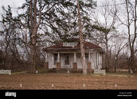 Old White House With Porch Surrounded By Trees Kansas Usa Stock Photo