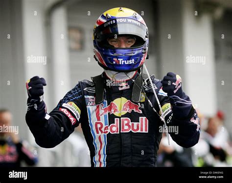 Australian Formula One Driver Mark Webber Of Red Bull Cheers In The