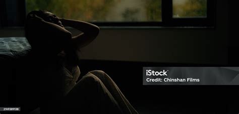 Indian Silhouette Sad Upset Depressed Lone Young Woman Sitting Alone Crying At Dark Indoor House