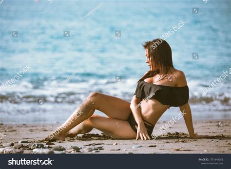Sexy Woman Sitting On Beach Bikini Stock Photo Shutterstock