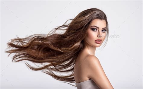 Portrait Of A Beautiful Woman With A Long Hair Stock Photo By Valuavitaly