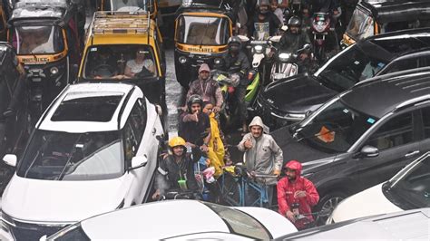 In Photos Mumbai Witnesses Heavy Rains Waterlogging And Traffic